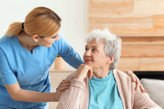 Nurse helping Patient